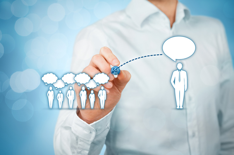 Someone showing effective communication by drawing others with thought bubbles Someone showing effective communication by drawing others with thought bubbles